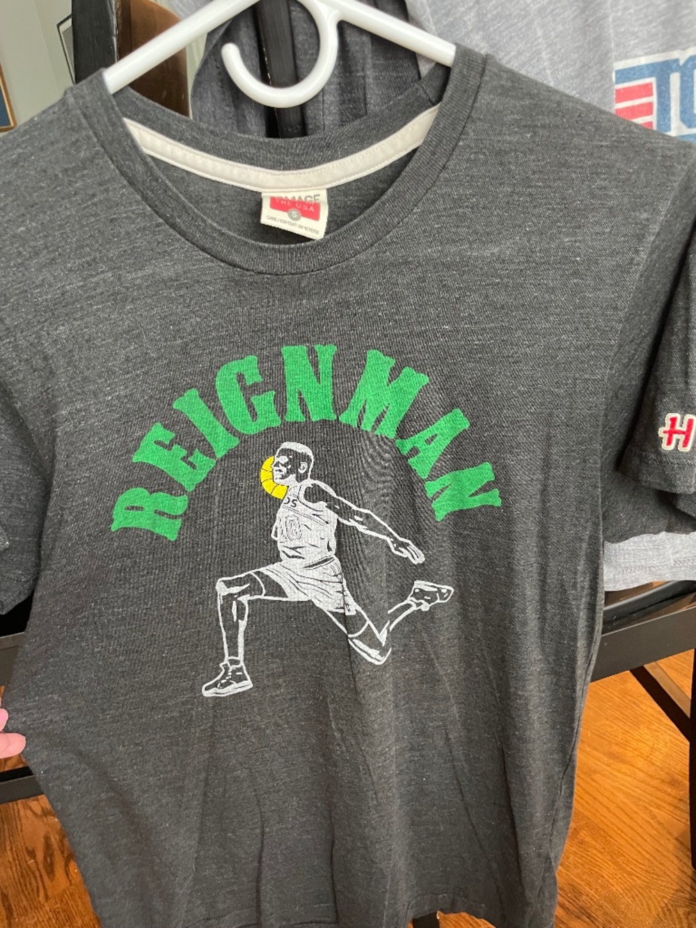 Homage T with NBA's Shawn Kemp "Reignman". Size, S; Color, Charcoal Grey.